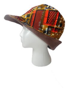Side view of reversible African wax bucket hat, structured brim and clean shape, handmade unisex hat