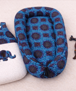 AfriBloom handmade baby sleep set with sleeping bag, matching baby nest and animal blanky in African wax print