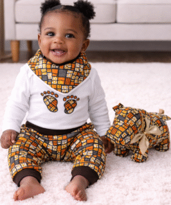African baby outfit worn by baby with handmade onesie, harem pants and matching bandana bib in wax print – AfriBloom baby clothing