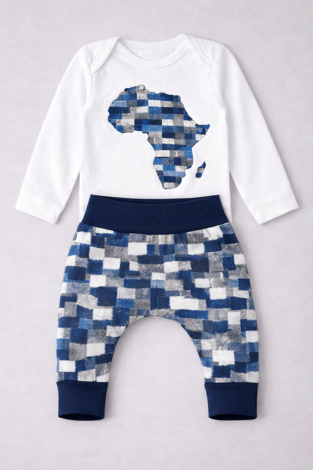 Handmade baby onesie with Africa map African print appliqué