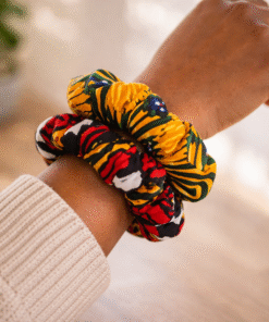 AfriBloom wax scrunchies worn on wrist showing real size, handmade African print hair accessories