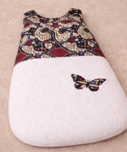 Handmade African print baby sleeping bag for newborns, cozy and safe infant sleep sack, unique nursery essential