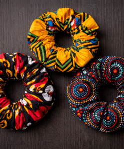 AfriBloom African wax scrunchies set of 3, handmade colorful hair accessories on dark background