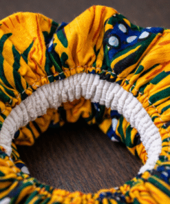 Close-up of handmade African wax scrunchie showing strong elastic and premium stitching, AfriBloom quality detail