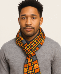 Unisex African print scarf worn by model, handmade statement scarf with colorful wax fabric, warm and stylish accessory