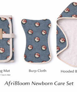 AfriBloom Newborn Care Set with hooded baby towel, changing mat and burp cloth in matching African wax fabric on white background