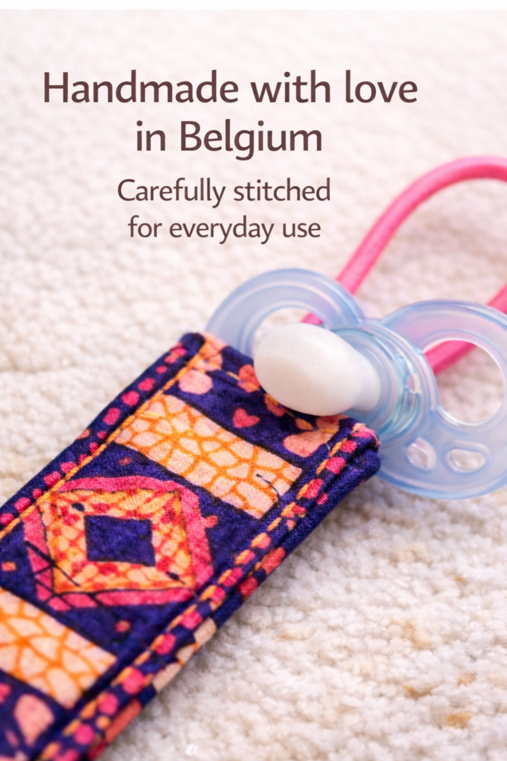 Handmade African print pacifier holder loop, carefully stitched in Belgium for durable everyday baby use