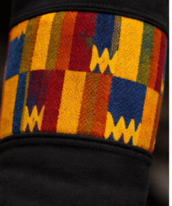 Close-up of African print sleeve detail on Afro Triangle men’s sweatshirt