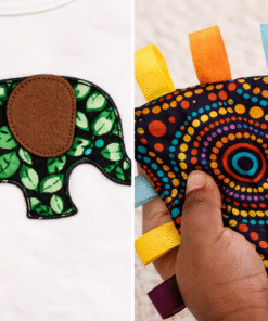 Close-up of AfriBloom baby outfit elephant appliqué and African print crinkle sensory toy with colorful tags
