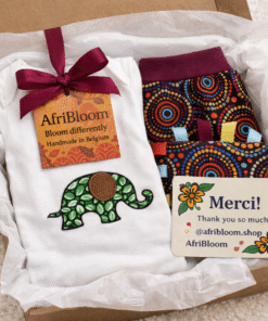 AfriBloom baby gift set in gift box with elephant appliqué onesie, African print pants and sensory crinkle toy