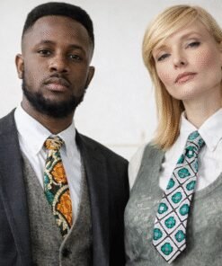 African wax print neckties by AfriBloom worn by a man and a woman with white shirts and blazers, modern unisex style, handmade in Belgium