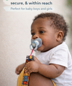 African print pacifier holder clip in use on baby – handmade wax fabric baby pacifier strap for newborns and infants
