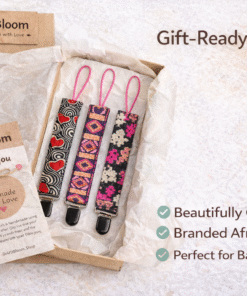 AfriBloom pacifier holder set gift-ready packaging with handmade African print clips and branded thank you card