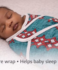 Secure African print baby swaddle helping newborn sleep better, breathable cotton handmade wrap for safe sleep
